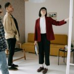 Real estate agent showing a house to a couple